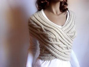 Is it a sweater, a wrap, or a scarf? This garment by Pille Ploomipuu (via Etsy) defies definition in existing terms. Ploomipuu is able to be innovative in her designs because they do not conform to standard terminology. 